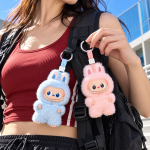 Labubu Exciting Macaron Duo – 2 Blind Boxes — street lifestyle with the two collectibles at human scale