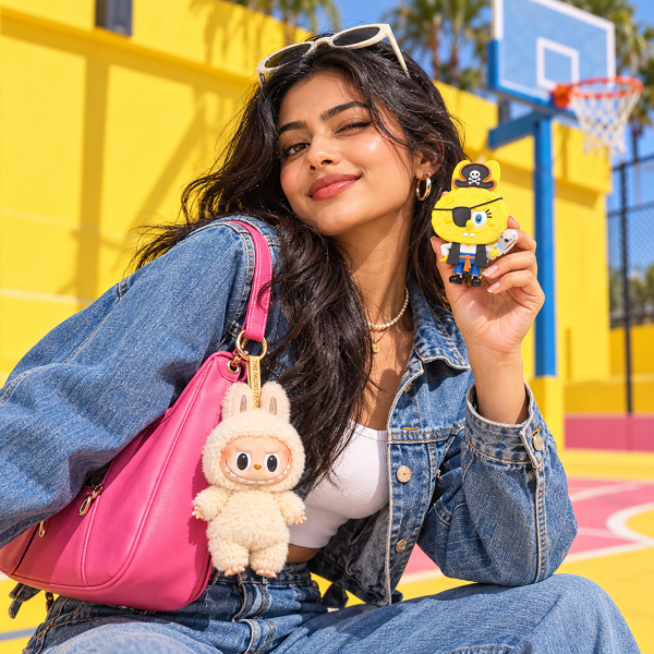 Labubu Exciting Macaron + Labubu × SpongeBob Duo – 2 Blind Boxes — street lifestyle with the two collectibles at human scale